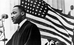 MLK with American flag