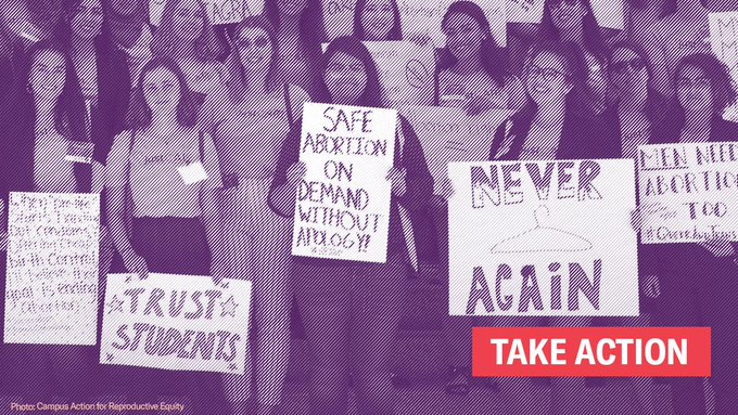 students with signs supporting abortion