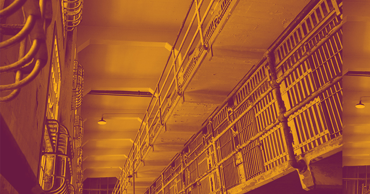 interior of a jail with light orange and dark burgandy overlaid