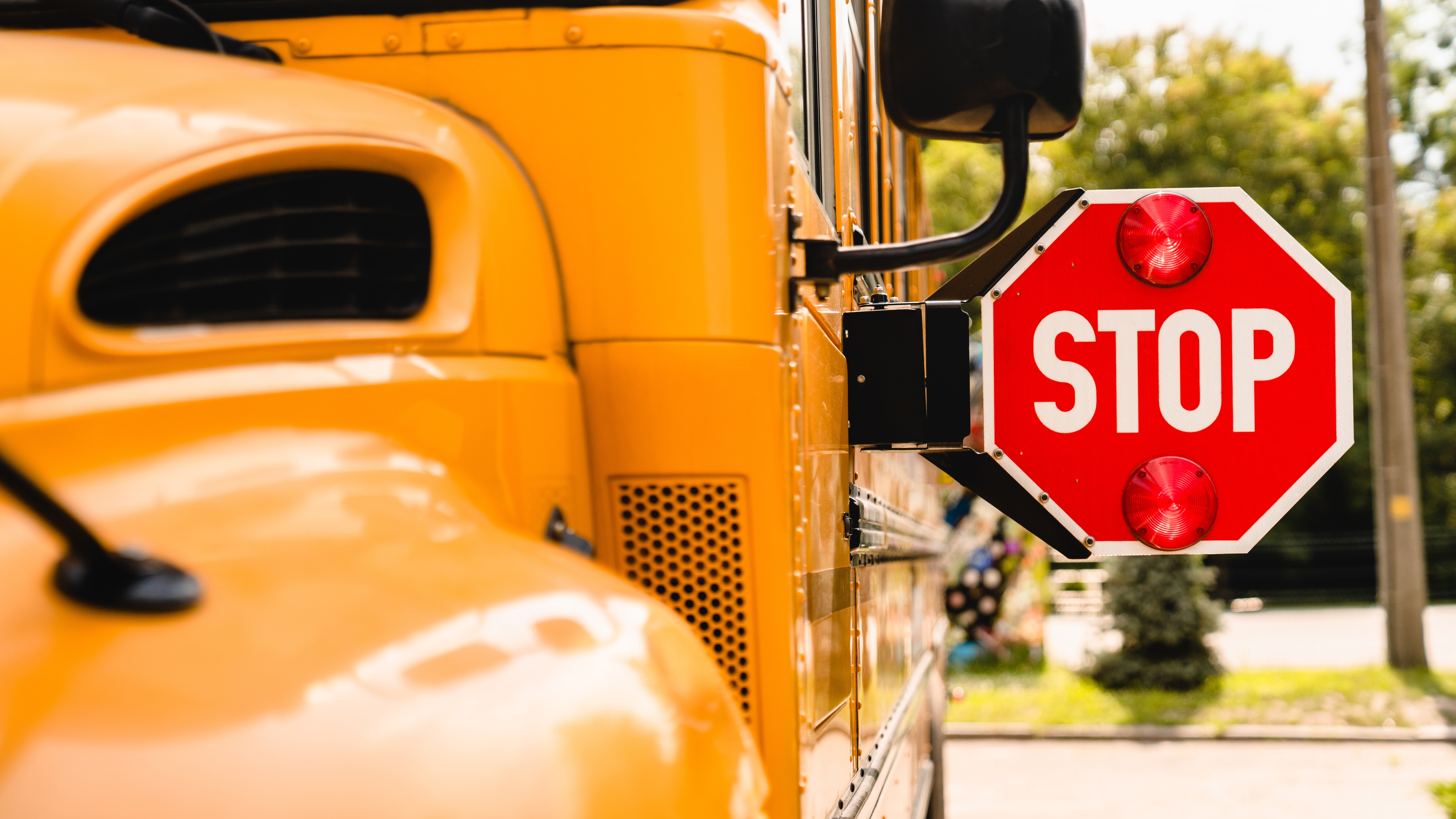 school bus with stop sign popped out