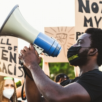 Cropped photo of man with megaphone