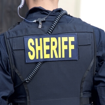 Sheriff seen from behind