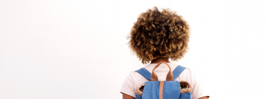 child with backpack