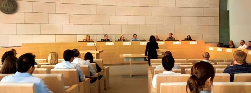 photo of group of people at a council meeting