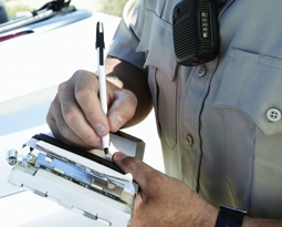 CHP officer writing a ticket
