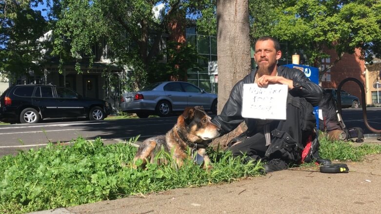 Client Faygo Clark with his sign