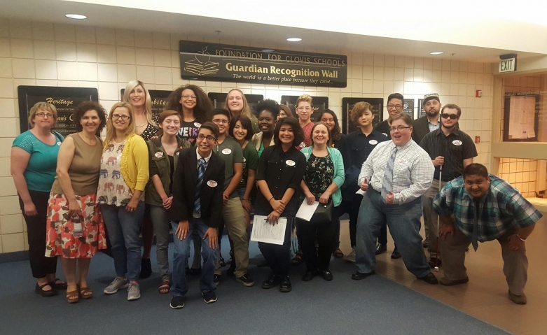 Clovis students and parents and Abre' Conner at a school board meeting about the dress code