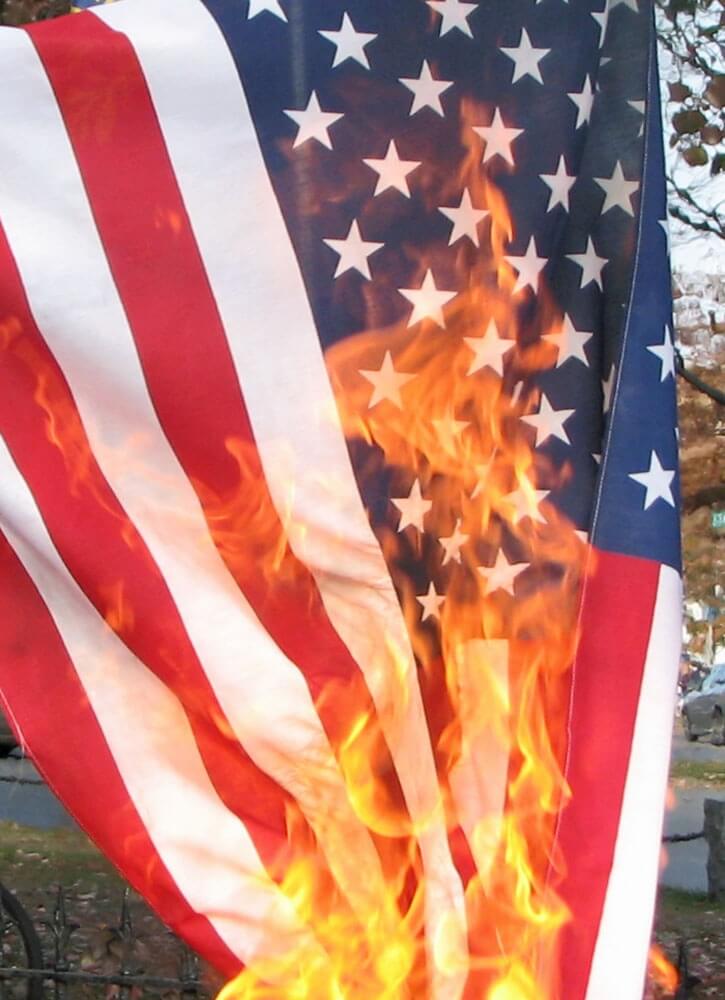 United States flag being burnt in protest, in New Hampshire on the eve of the 2008 election.
