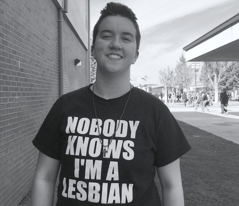 ACLU client Taylor Victor wearing t-shirt at school that reads "Nobody Knows I'm a Lesbian"