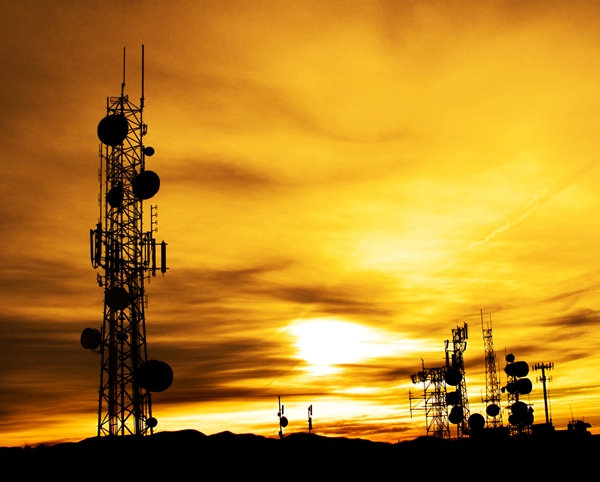 cell phone tower at sunset