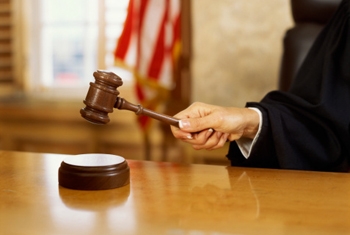 Judge hitting gavel