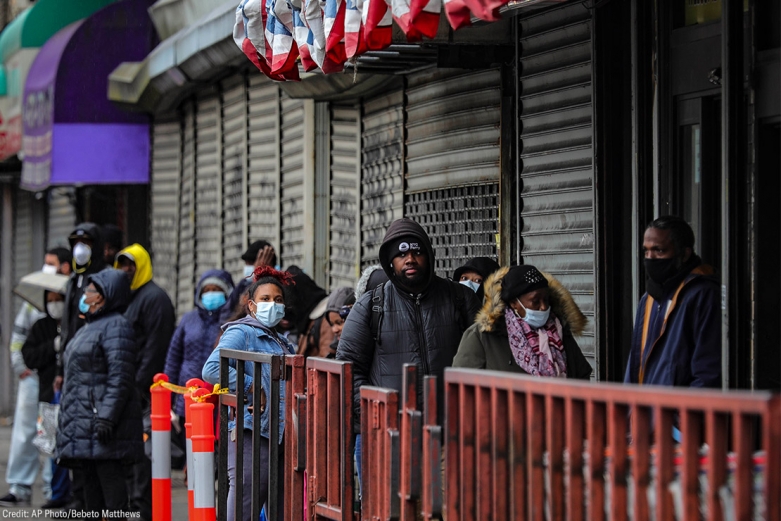 black people waiting in long line