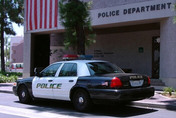 Police cruiser parked in front of police station