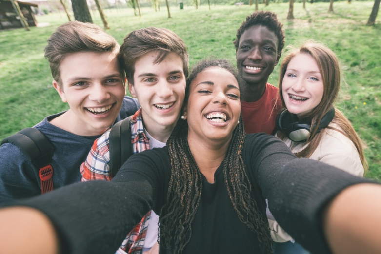 teenagers taking a selfie
