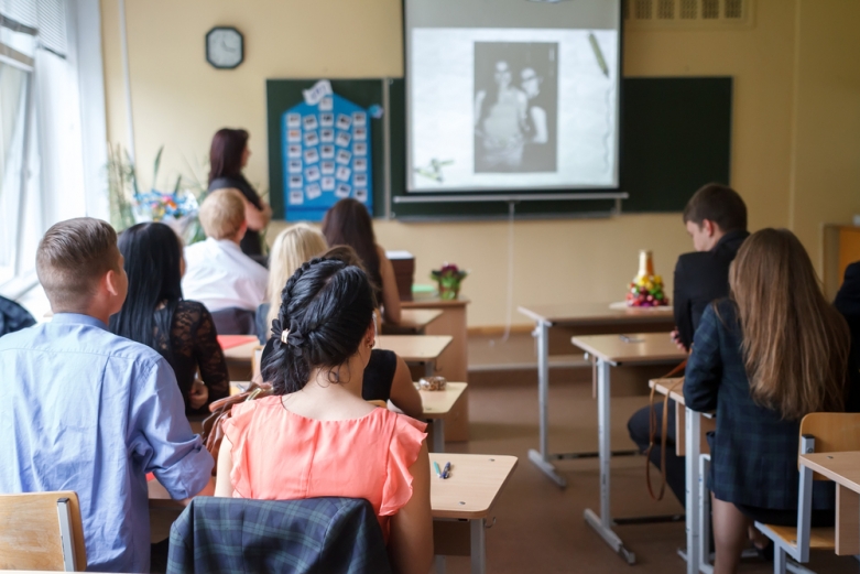 Students in a classroom via Shutterstock