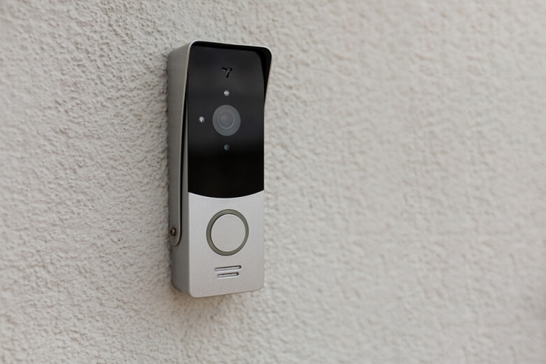 Doorbell camera on grey wall