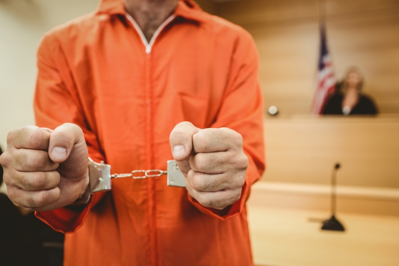 person handcuffed in court