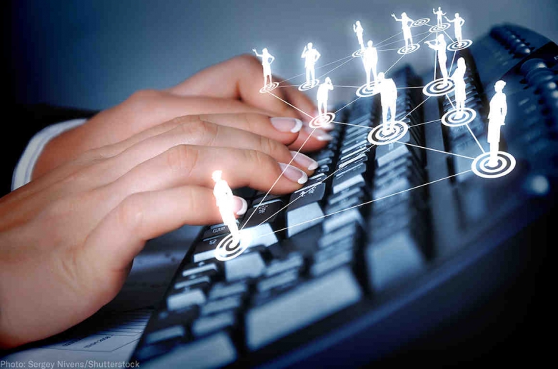 stock photo of a person using a computer keyboard