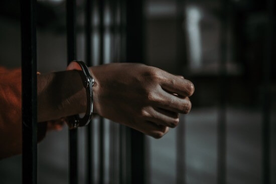 person behind bars