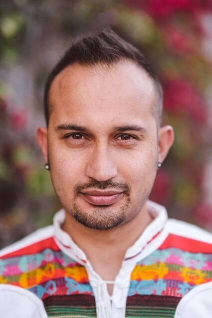 portrait photograph of ACLU NorCal artist-in-residence, Edgar Arturo Comacho