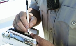 CHP officer writing a ticket
