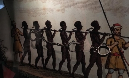 mural of chained enslaved people