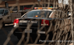 Police car with writing on the trunk that reads District Police