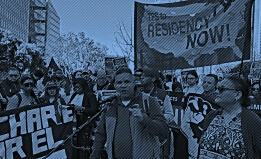 A crowd gathered for a rally in support of TPS holders in San Francisco with a sign reading, "TPS to Residency NOW!"