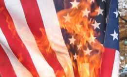 United States flag being burnt in protest, in New Hampshire on the eve of the 2008 election.