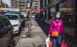 shopper on sidewalk flushing queens