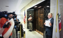 Ashton Lee delivering petitions to Gov. Brown