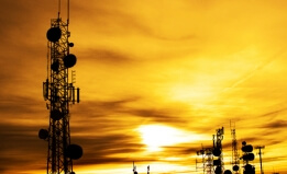 cell phone tower at sunset