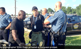 Getty photographer Scott Olson arrested at Ferguson protest.