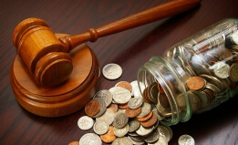 gavel with coins