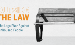 A bench is to the right with text to the left that reads "Outside the Law"