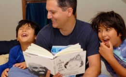 Abdi Soltani reads his "A Light in the Attic" to his two sons