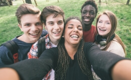 teenagers taking a selfie