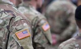 U.S. soldiers wearing camouflage uniforms. 