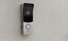 Doorbell camera on grey wall
