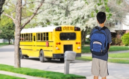 student waiting for bus