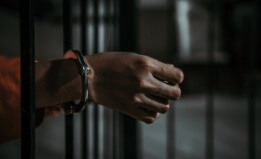 person behind bars