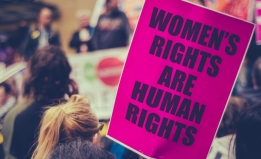 Close up of a pro-choice protest sign in a crowd of protesters. It reads Women's Rights Are Human Rights