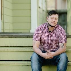 man sitting on stairs