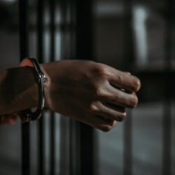 person behind bars